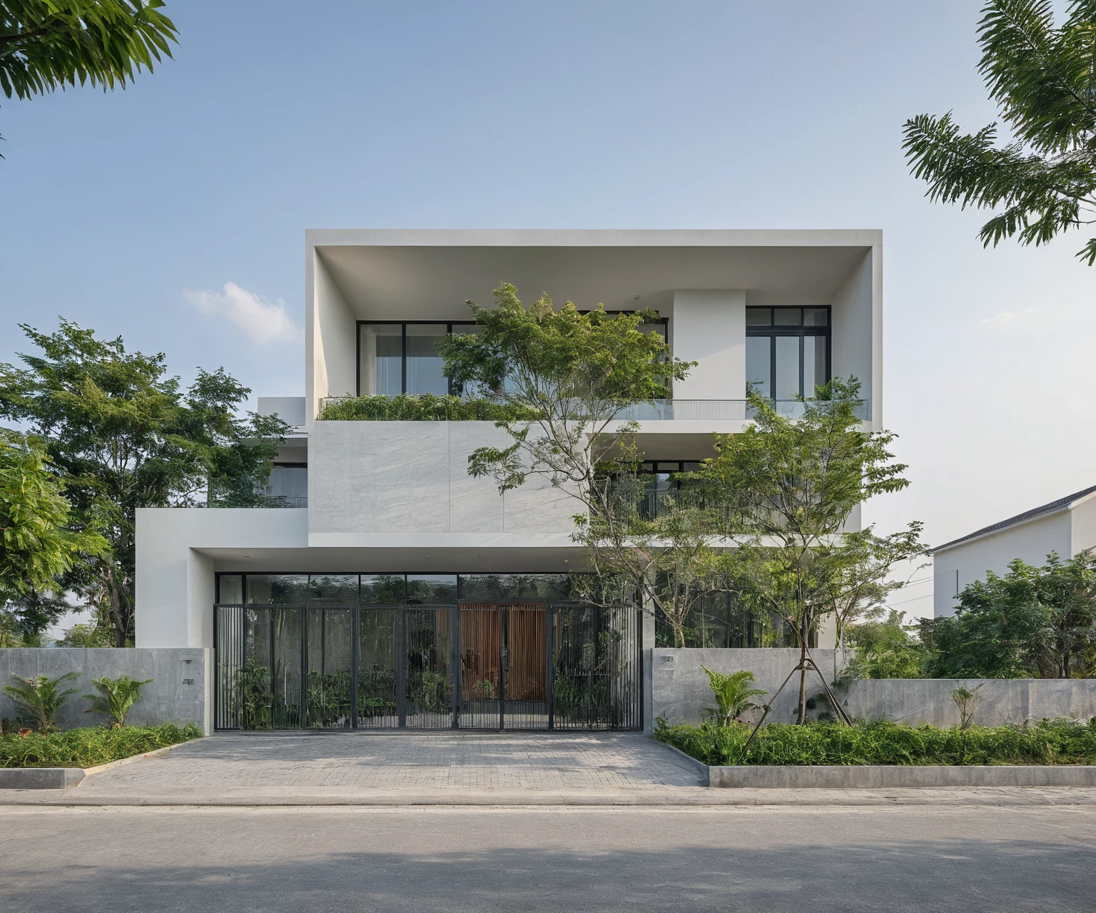 Raw photo, Masterpiece, high quality, best quality, authentic, high realistic, super detail, Realistic green tree exterior, outdoors, Tuonghoagio, house, modern stytle, on the street, wind flower wall, glass windows, GRAY STONE wall, GRAY metal gate, metal railing, house style modern on the street road, pavement, grass, trees, sky, cloud, (daylight:1.1)