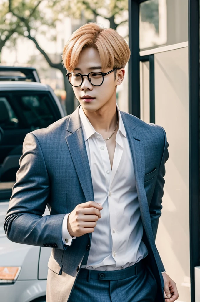 Park Jimin from BTS blonde with glasses and a wedding suit