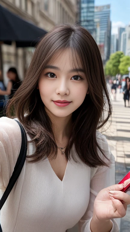 A beautiful woman taking a selfie on a sunny summer day in a bustling city street, smiling naturally at the camera. She is holding a smartphone with one hand, capturing herself and the lively urban environment in the background. Tall buildings, cafes, and pedestrians are visible, with bright sunlight and vibrant colors.
 