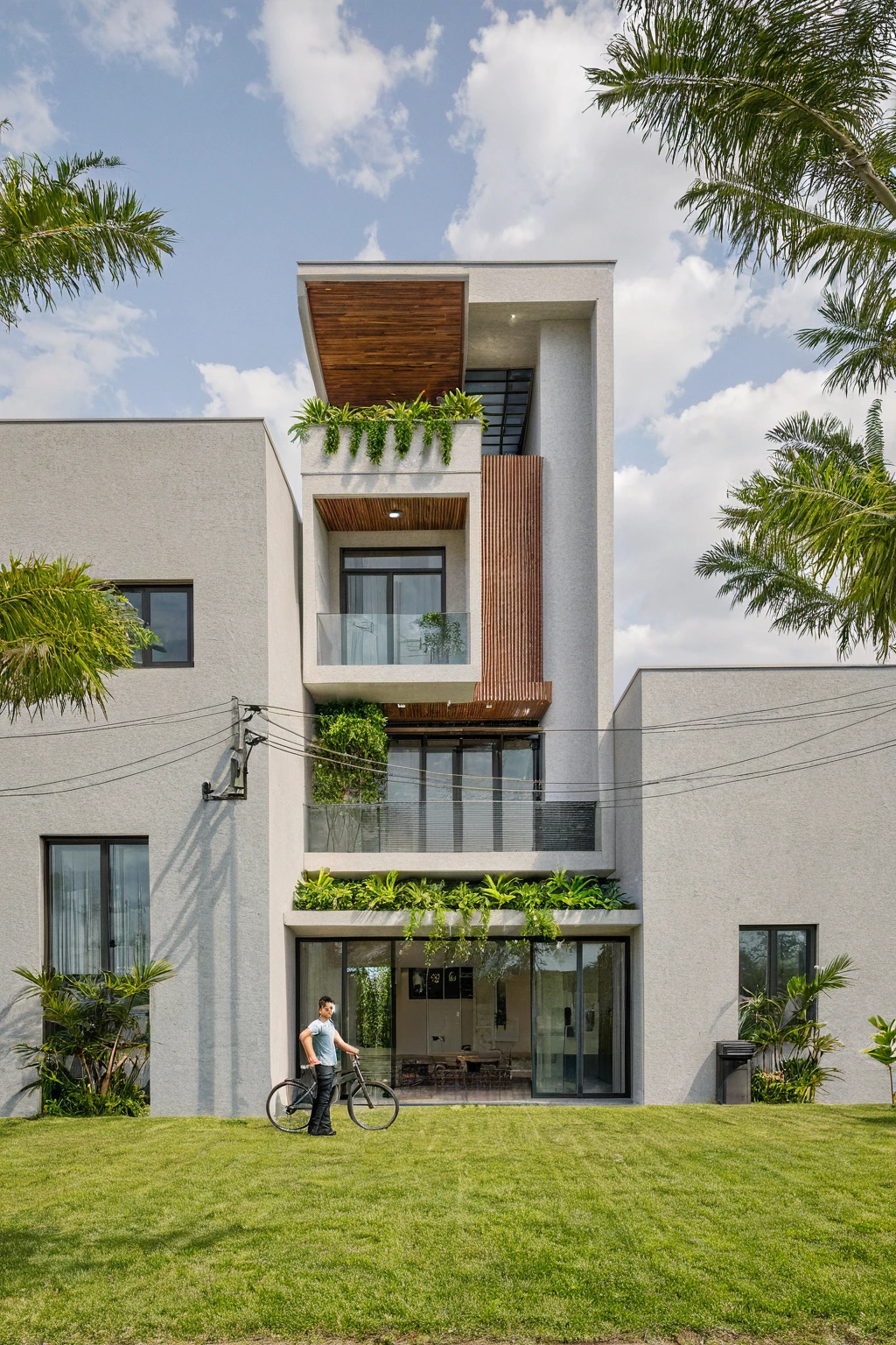 Photo brute,head of'artwork, High quality, best quality, authentique, great detail,
Outside, En plein air, house, Nhamainhat, aiaigroup sur le jardin tropical, Ligne minimaliste,villa de plain-pied, style moderne, gray tile roof brick yard,grass,tropical trees, sky, (jour:1.1),Arrière-plan du jardin tropical