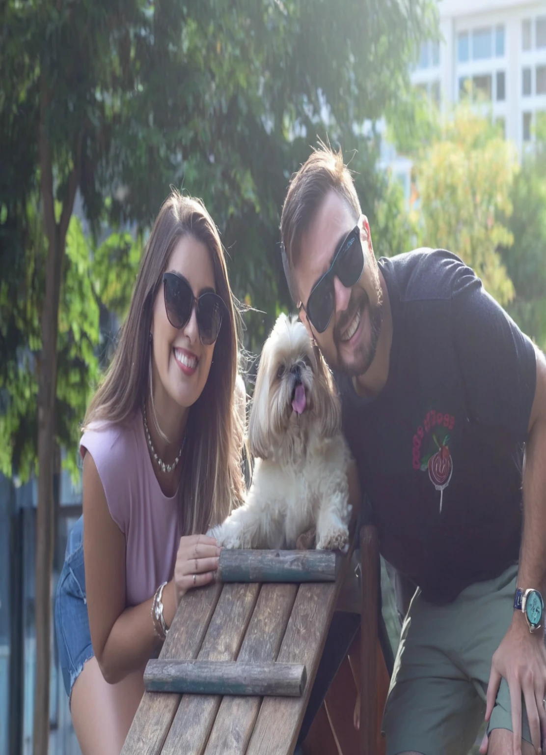 Couple walking their shit tzu dog, giggling, dog with tongue out, mulher loira sorgiggling com oculos de sol. Homem loiro sorgiggling e com oculos de sol. Dog on a wooden slide. Sunny background with trees. (high resolution) (high on details)