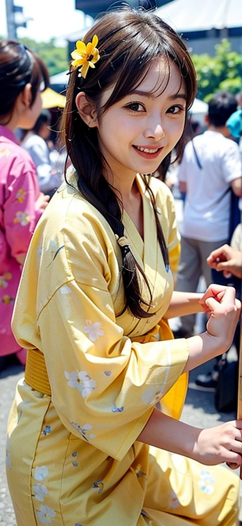 A woman wearing a yellow floral yukata having fun at a summer festival in the evening