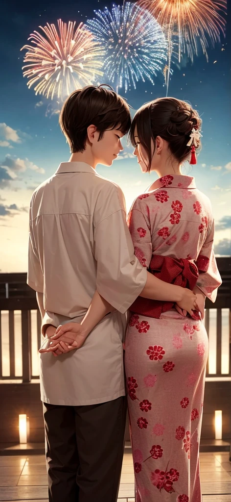 An impressive fireworks display with a couple in yukata standing with their backs to each other