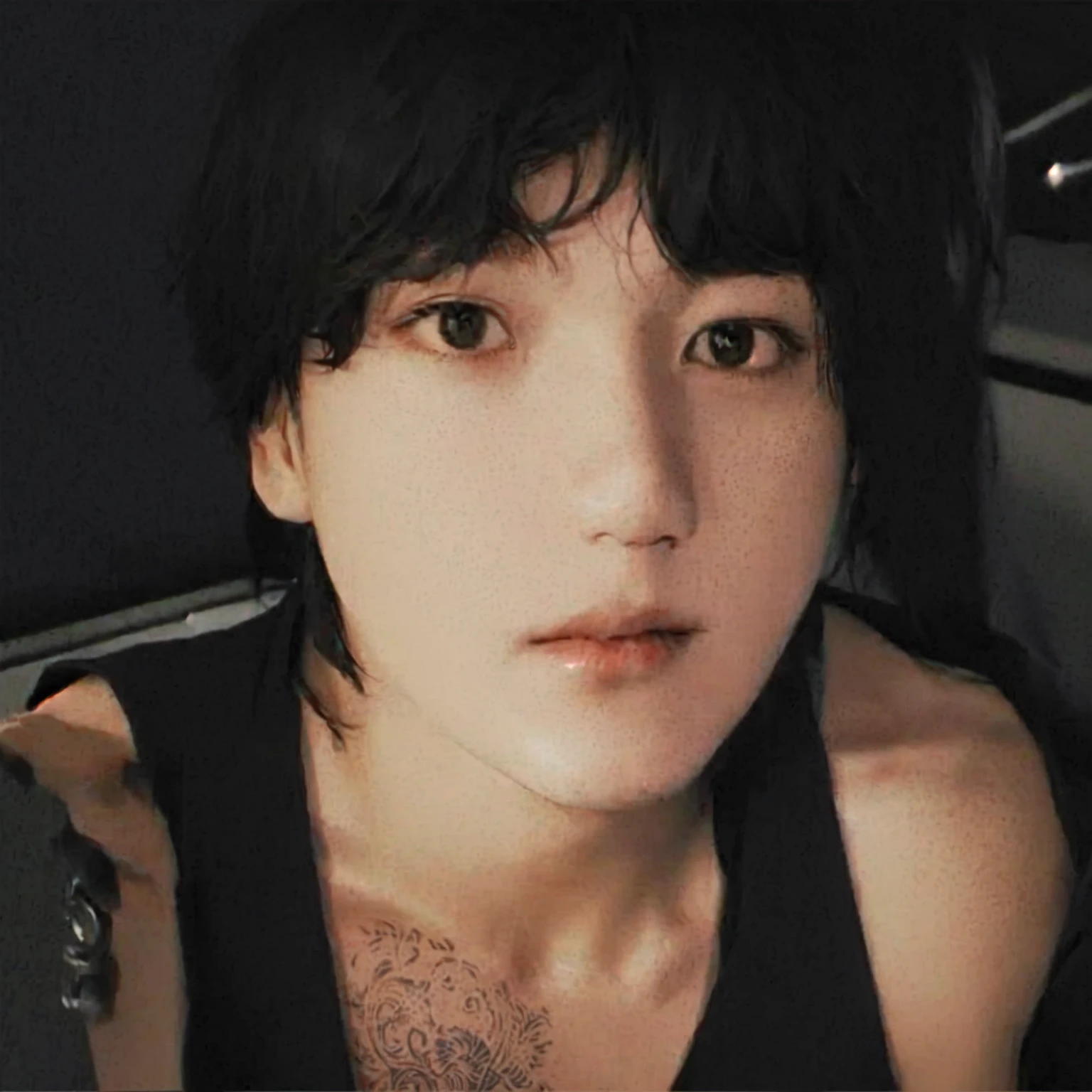  There is a man with a tattoo on his arm and a black tank top, grainy photo of a handsome man, Tae June Kim, leaked photo, sangsoo jeong, jiyun chae, with short hair, 21 year old man, low quality grainy, kwak ji jovem, profile image, heonhwa choe, Jungkook jk