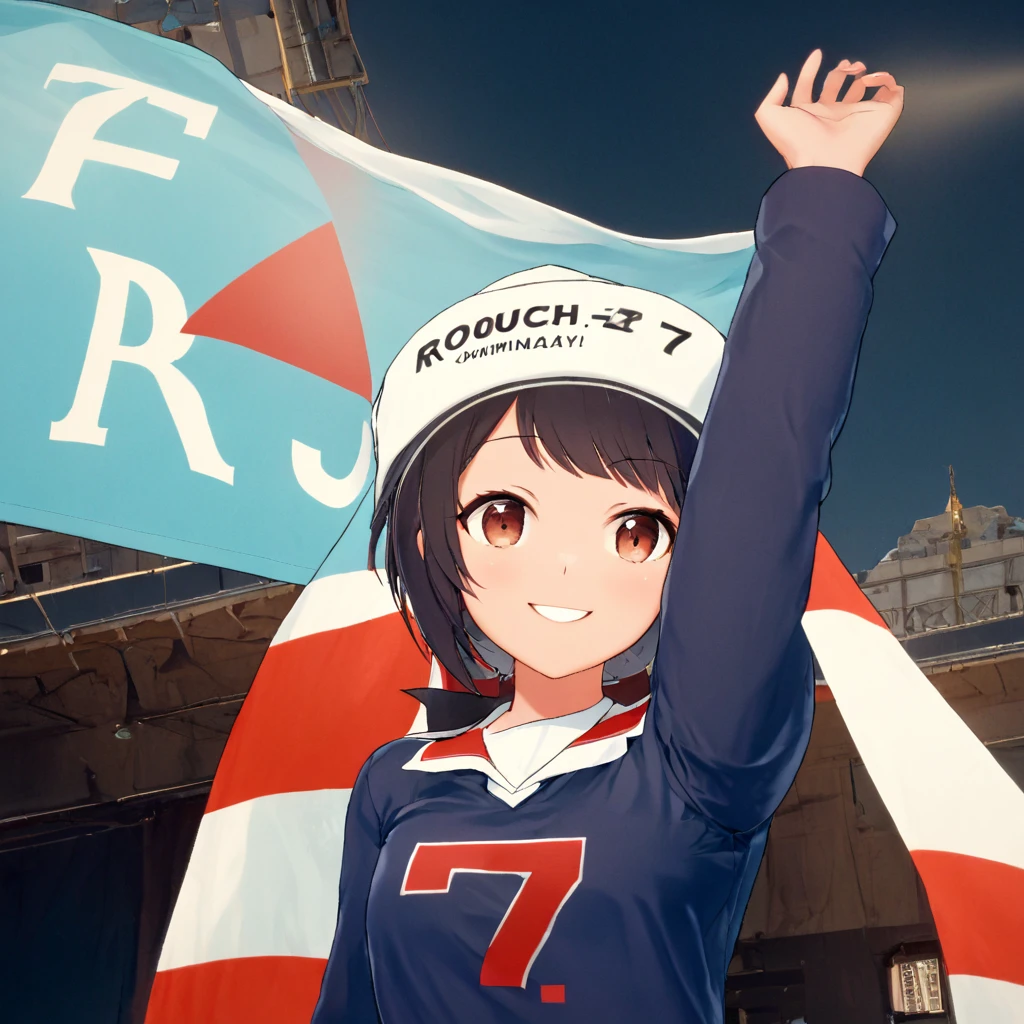 A photograph in wide view. A woman smiles and holds up a cloth banner,and  Waving it above her head, its a sign saying "rouch7". wears a navy red jersey with a white collar. On the shirt there is big text "rouch7". on a light blue background.