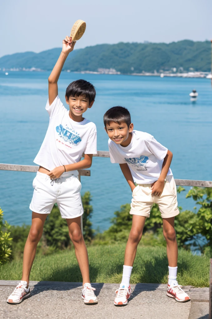 A tanned 12-year-old Japanese boy posing for a full-body photoshoot in shorts during summer vacation