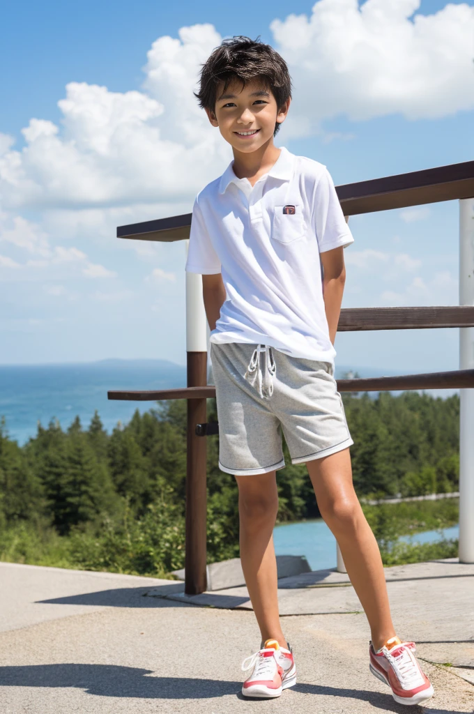 A tanned 12-year-old Japanese boy posing for a full-body photoshoot in shorts during summer vacation