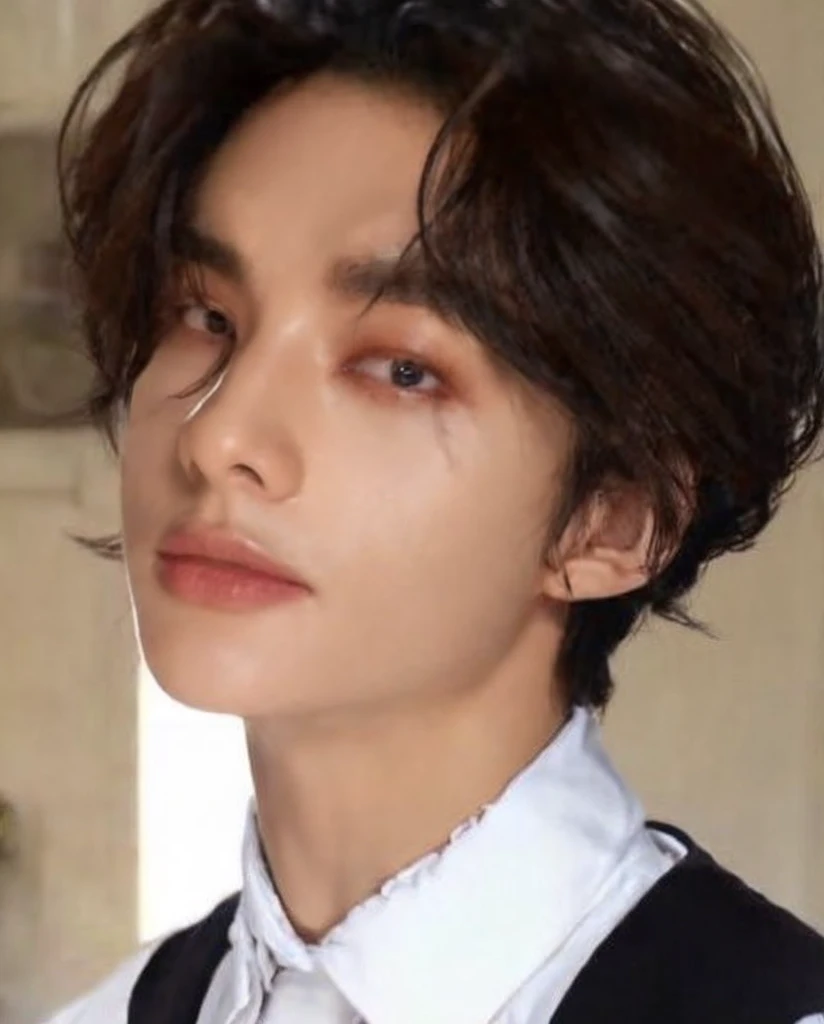 HYUNJIN HWANG, black wavy hair, highlighted cheekbones, thick lips, iris grises, slanted eyes.
