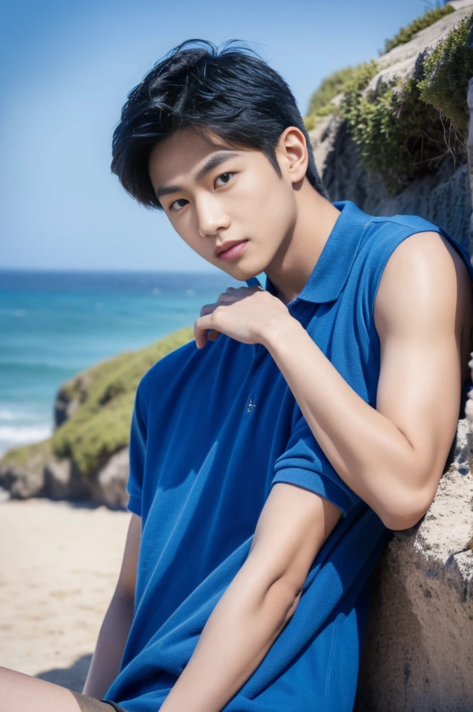 young asian man looking at camera in a blue polo shirt , seaside beach sunshine looking at the sea