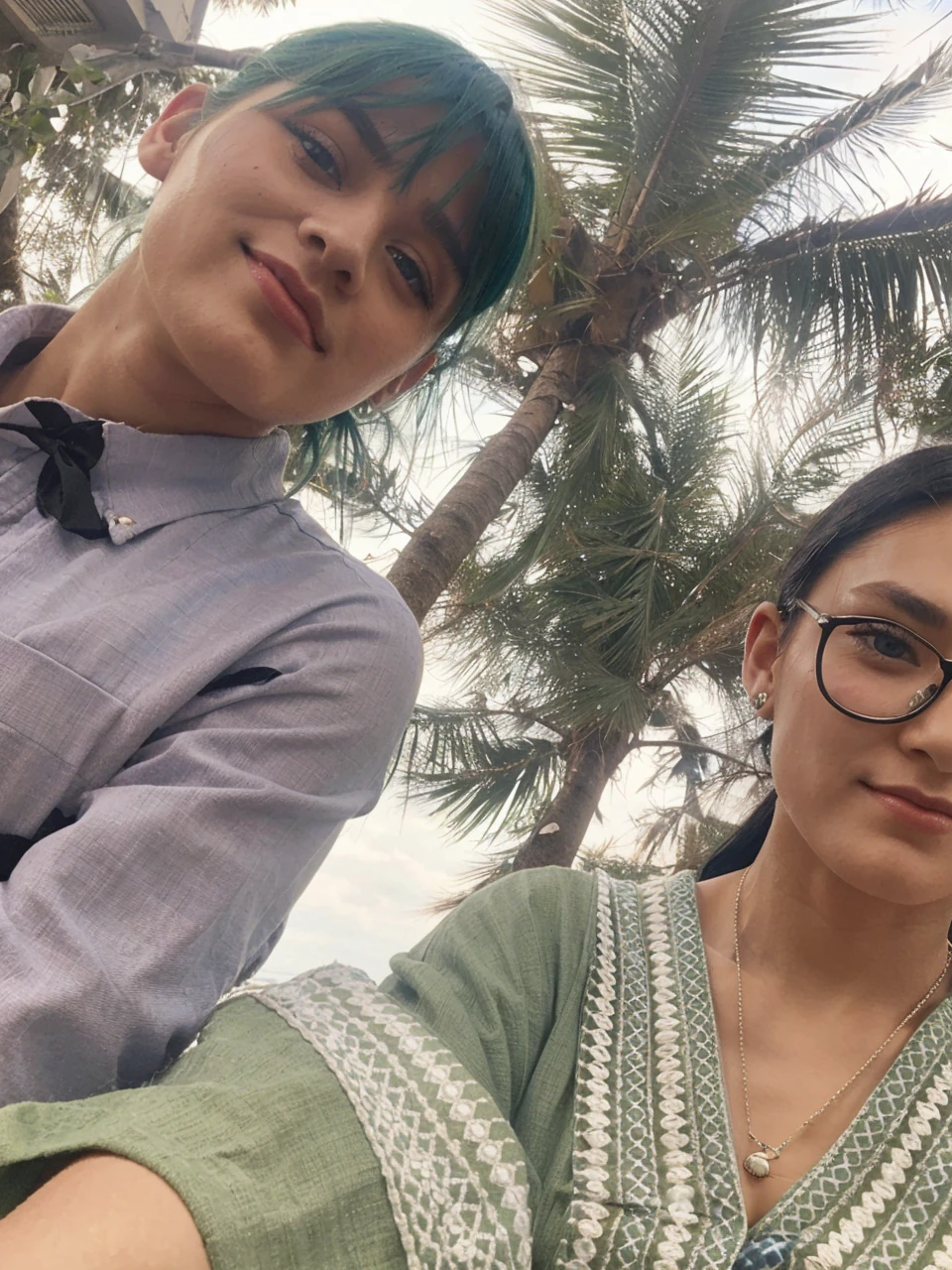 Girl with green hair and blue eyes With a kimono with a man Handsome with long black hair The girl is older than the man