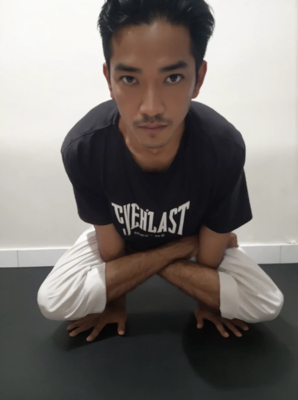 A man doing a yoga posture, identical pose as reference image, different hairstyle, Shaolin temple background, stocky build, extremely detailed and intricate fingers, long and delicate nails, sketch and painting style, wearing appropriate yoga attire, (best quality,4k,8k,highres,masterpiece:1.2),ultra-detailed,(realistic,photorealistic,photo-realistic:1.37),HDR,UHD,studio lighting,ultra-fine painting,sharp focus,physically-based rendering,extreme detail description,professional,vivid colors,bokeh,concept art