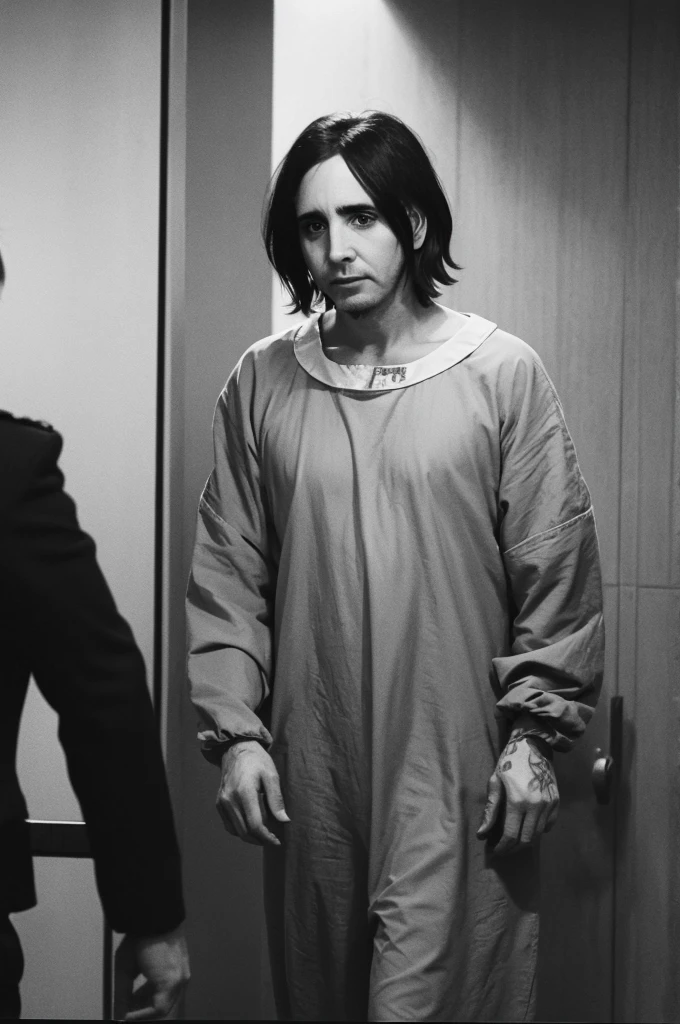 Photo of Manson in court, exterior of a prison