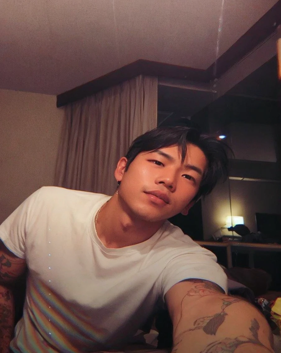 Asian boy in a dark room