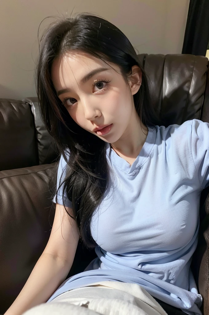 Girl wearing scrubs blowjobs on a black sofa