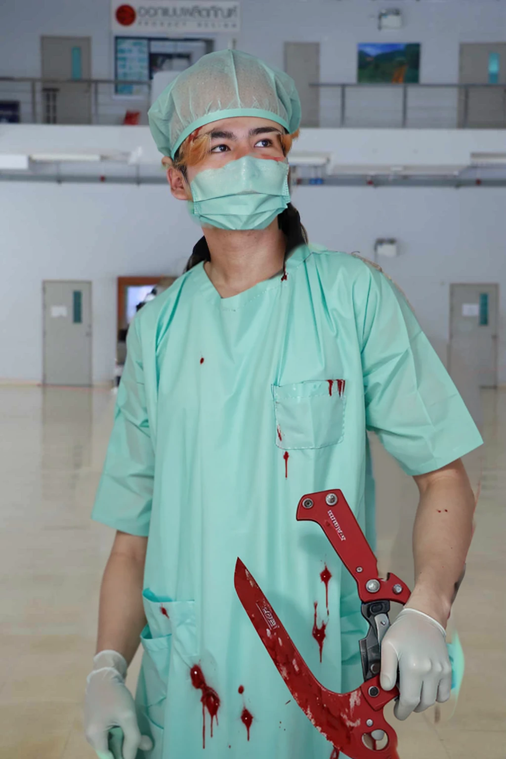 blood-stained surgical gown with visible splatters and smears of blood.
Surgical gloves, also covered in blood, with some tears and wear.
A surgical mask that has dark, ominous stains and possibly a sinister smile peeking from behind it. Holding a bloody scalpel or surgical saw in one hand, with blood dripping from the blade.
Other surgical tools like forceps or scissors can be tucked into the pockets of the gown, also stained with blood.
A headlamp or surgical cap with blood splatters for additional detail.