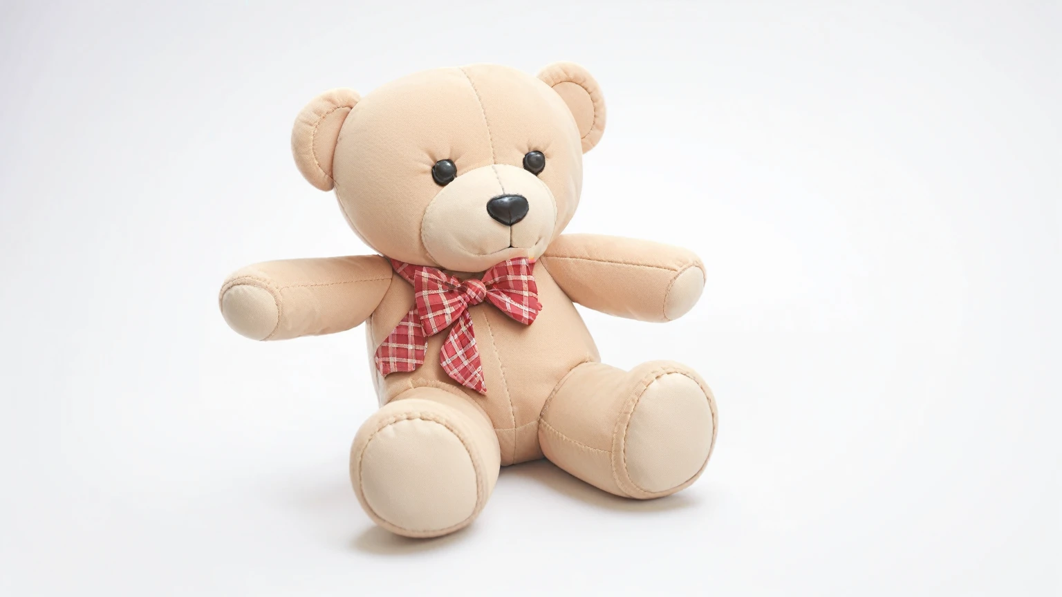 there is a teddy bear with a bow tie on it, teddy bear, stuffed toy, laying teddy bear, stuffed toy, stuffed toy, 動物のstuffed toy, Cute Toys, coronavirus as a stuffed toy, holding a teddy bear, stuffed toy, the teddy bear is holding a gun, stuffed toy photography, stuffed toy, Cute and huggable, Miniature bear