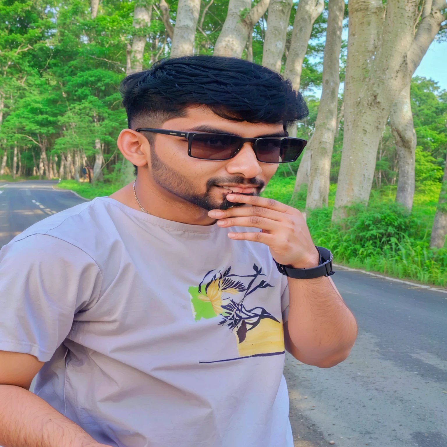 there is a man standing on a road with a toothbrush in his mouth, assamese aesthetic, mohamed chahin style, portait photo profile picture, in front of a forest background, with accurate face, with a cool pose, candid picture, riyahd cassiem, * colour splash *, jayison devadas style, jayison devadas, with lovely look