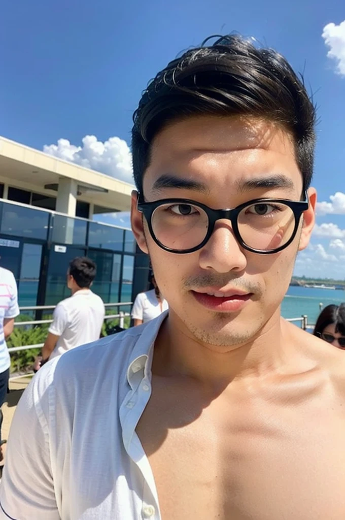 A young Asian man with glasses and large muscles looks at the camera. In a white button-down shirt , seaside beach sunlight looking at the airport