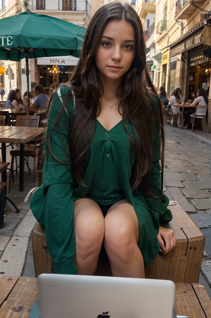 create a photo of a girl with long chocolate hair, with emerald eyes who sits at a laptop and works, against the backdrop of a street cafe in Spain