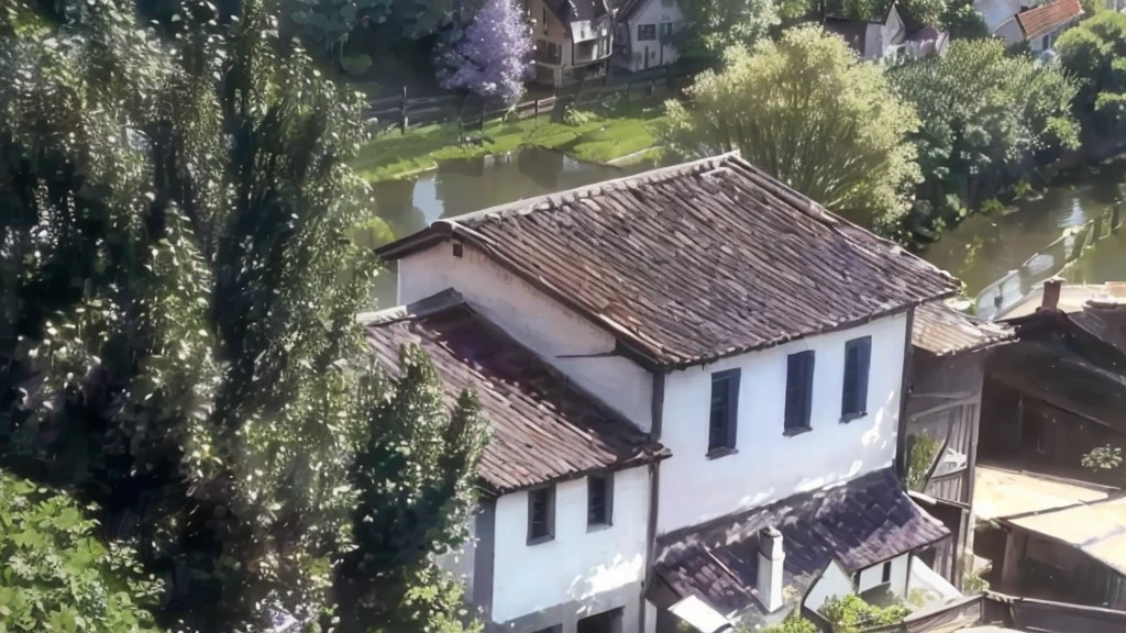 there is a white house with a brown roof and a brown roof, building along a river, colonial house in the background, small town house, small town, old house, stream flowing by the house, photo taken from above, gui guimaraes, viewed from the top, video still, close de cima, from above view, shot from 50 feet away, Farm house, lighting and colors in the Impressionist Claude Monet style with shades of lilac, blue and yellow, an atmosphere of speed and power - Claude Monet style impressionist painting