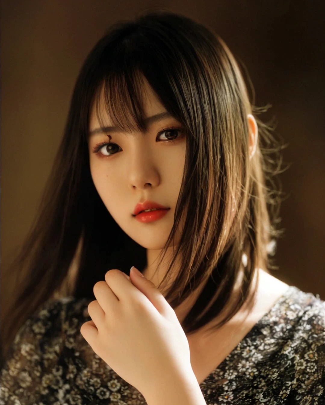 A beautiful Japanese girl with ultra-detailed eyes, high-detailed skin, red lips, masterpiece, best quality, 8k, hyperrealistic, photorealistic, professional, vivid colors, studio lighting