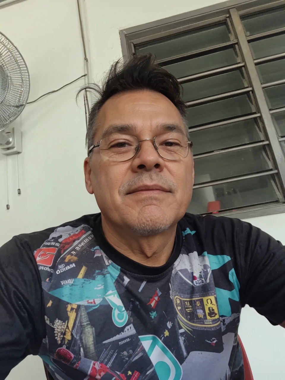 The face of a 60-year-old gray-haired man with glasses,for a YouTube profile 