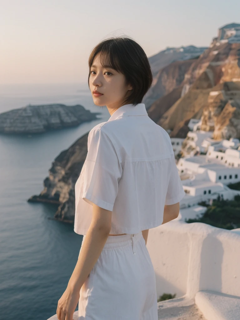 her name is Asako, high quality, 1girl, ((20-year-old fit Caucasian woman)), ((20 years old)), ((slim)), ((Korean Short Bob)), pose: standing, wearing Contemporary Generation-Z modern wear different colored, BACKGROUND: "Watching the sunset and then the stars from the cliffs of Oia, with the white-washed buildings glowing softly."