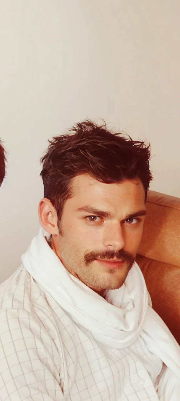 Jamie dornan, an award winning photograph of a (handsome man:1.1), detailed, trending on artstation