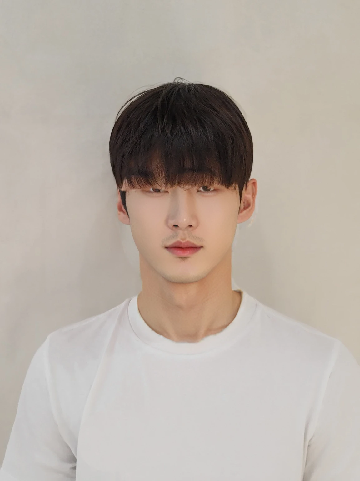 Best Quality, 8k, Masterpiece, (Portrait: 1.3), (photo realistic:1.4), (hyper realistic:1.4), Sharp Focus, looking at viewer, (smoother lighting:1.1), (increase cinematic lighting quality:0.9), realistic lighting, backlighting, light on face, ray trace, (brightening light:1.2), (Increase quality:1.4), sharp detail, (best quality real texture skin:1.4), finely detailed eyes, black_eyes, finely detailed face, 25 year old Korean man