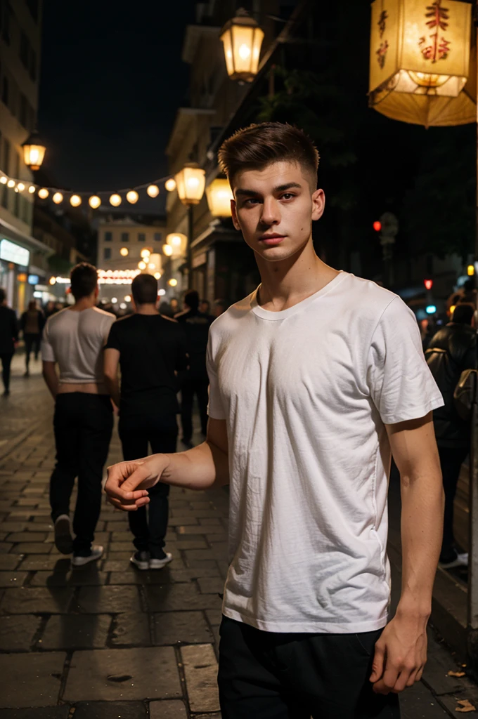 a man of Slavic appearance, 24 years old, on the street in the evening under the light of lanterns in the city in a white T-shirt