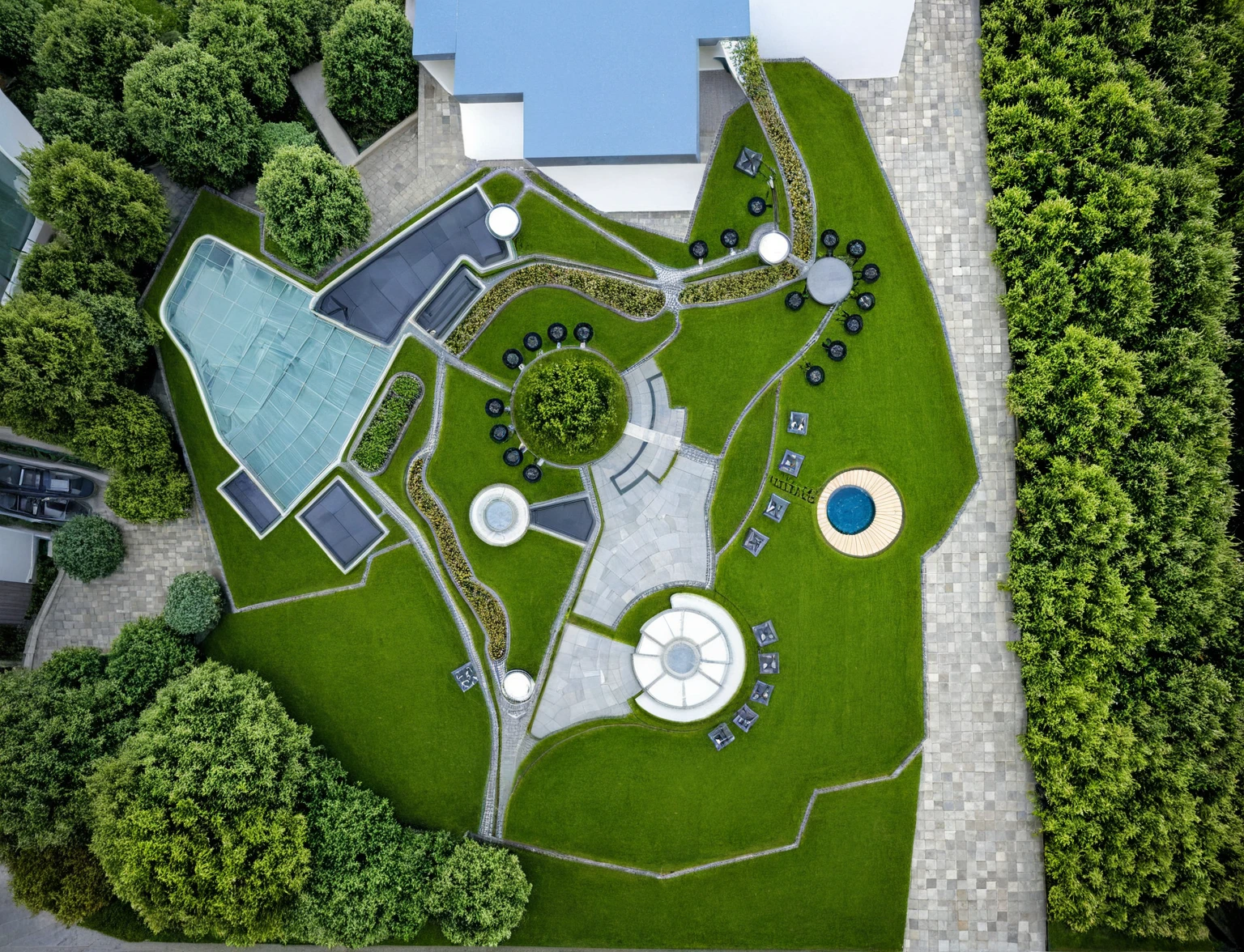 Masterpiece, high quality, best quality, authentic, super detail, outdoors, building style modern, Highrise, white wall, glass windows, gate road, pavement, grass, trees, blue sky, cloud, (day:1.1), realistic lighting