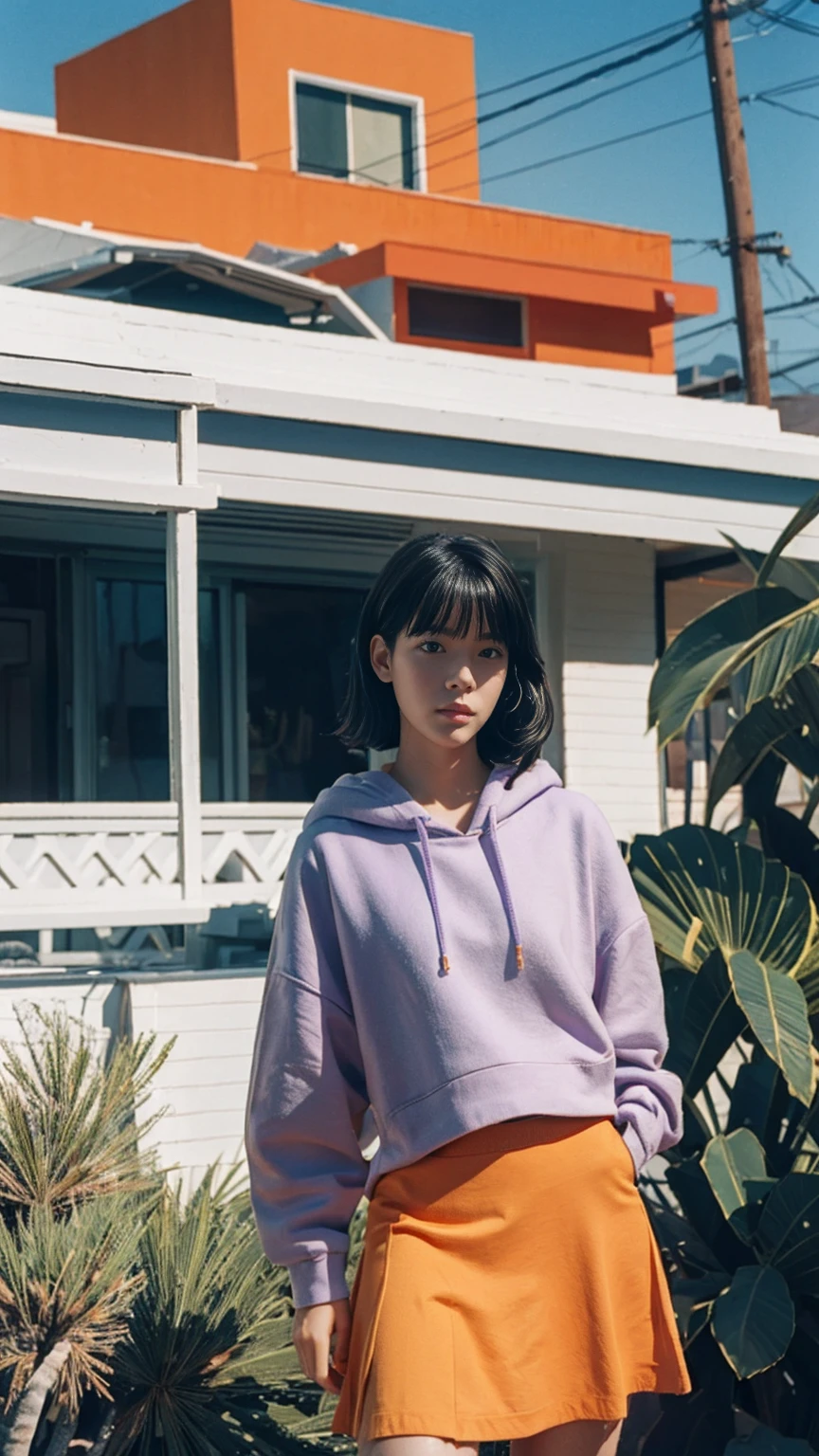 long shot portrait of cute 23 yo girl ,wear ((orange color oversized_hoodie)), wear ((purple tennis skirt)),looking front,Best Quality,Masterpiece,Ultra High Resolution,(Realisticity:1.4),Original Photo, 1Girl, light leak,ultra high resolution,UHD,beautiful, (black bob hair), almond eye, no makeup, in front of (80's mondrian architecture motel), (realistic:1.2), (surreal:1.3), (very detailed:1.1), ((masterpiece)),summer, blue sky, palm trees,sunny, los angles vibes,film camera, 800mm lens,style of Philip Lorca diCorcia