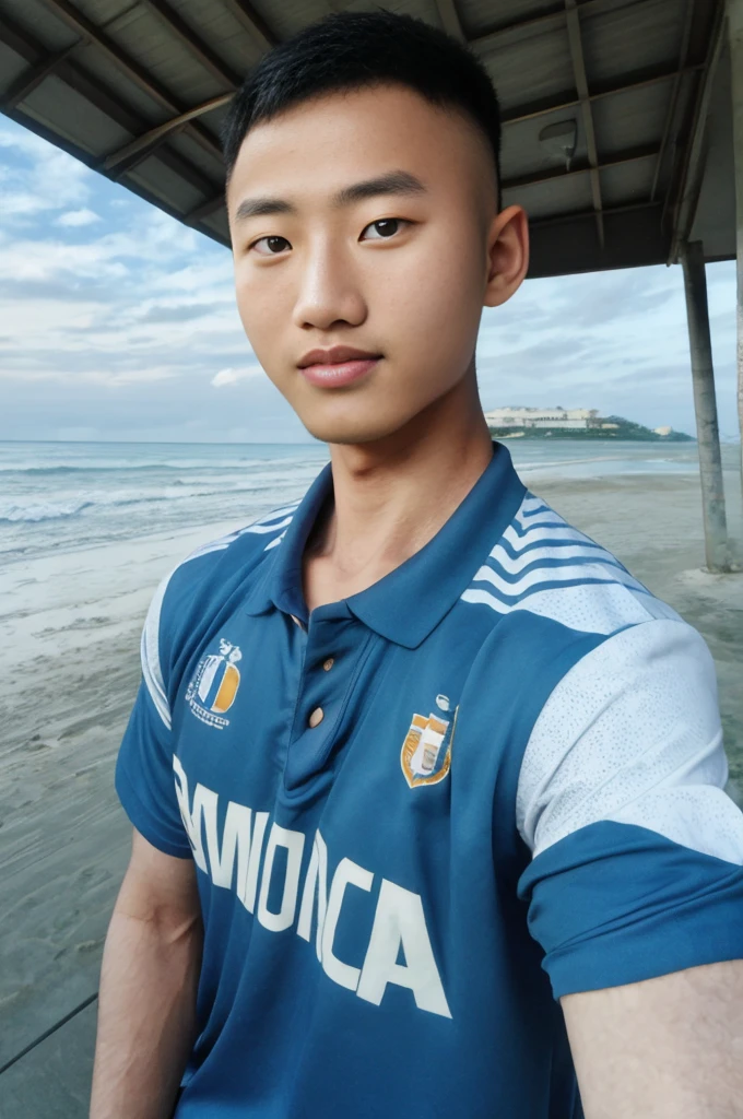 young asian man looking at camera in a blue sports shirt , Fieldside, beach, sunlight