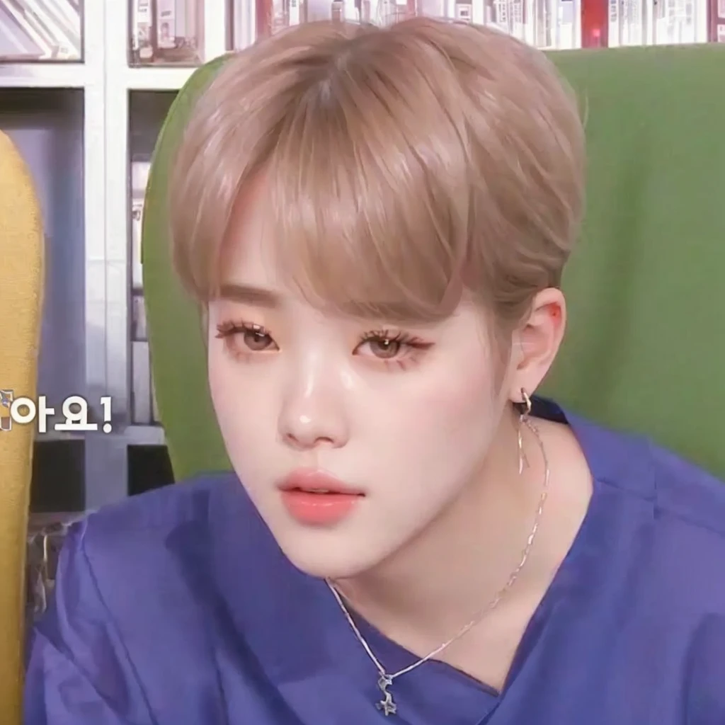 a close up of a person sitting on a chair with a necklace on, accurate Jimin face, Jimin\the full lips, Jimin\the Greek nose, Jimin, Jimin\the right eyelid is swollen, park Jimin, Kim Doyoung, jung jaehyun, he has an elongated head shape, drainage gang bladee, adorable and pale korean face