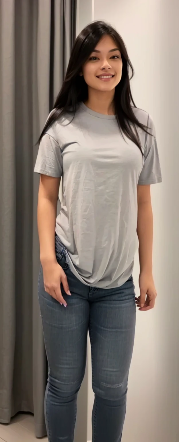 a woman standing in front of a mirror wearing a gray shirt and jeans, gray shirt, wearing a tshirt, wearing pants and t-shirt, thick, tight shirt, wearing a shirt leve, wearing tight shirt, wearing a shirt, wearing in shirt, hand on hips, wearing a shirt and a jean, tied shirt, wearing simple, tight-fitting clothes