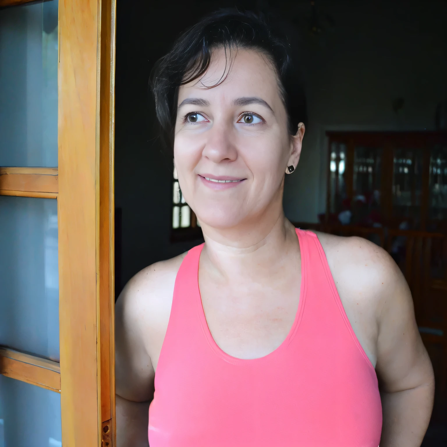 there is a woman standing in a doorway with a pink tank top, malika favre, by Nándor Katona, 3 5 year brazilian mother, 30-year-old woman from cuba, fernanda suarez, portrait of a 40 years old women, sandra chevier, 40 years old women, caroline gariba