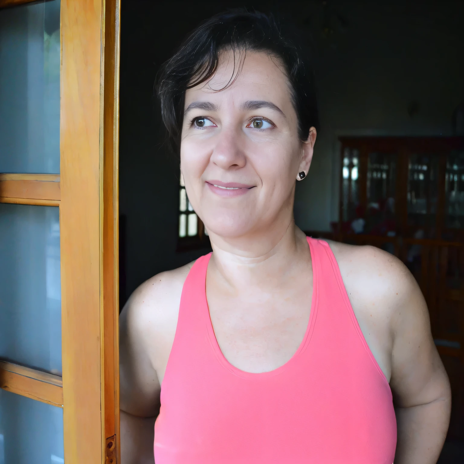 there is a woman standing in a doorway with a pink tank top, malika favre, by Nándor Katona, 3 5 year brazilian mother, 30-year-old woman from cuba, fernanda suarez, portrait of a 40 years old women, sandra chevier, 40 years old women, caroline gariba