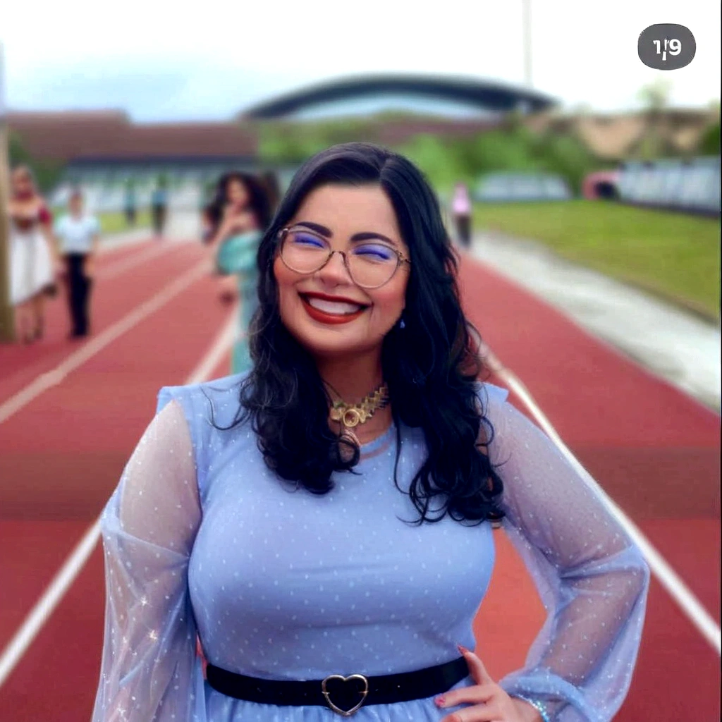 plump woman in a blue dress and glasses standing on a runway, the background is heavenly, bokeh only in the background, powder Nándor Katona, yearbook photo, alanis guillen, por Reyna Rochin, by Olivia Peguero, in front of a forest background, inspired by Gina Pellón
