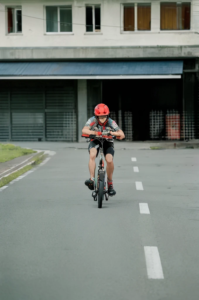 (Best quality,A high resolution,Ultra-detailed,Realistic:1.2),2024 bikers, red helmet, outfit, folding bike(promotional poster)。