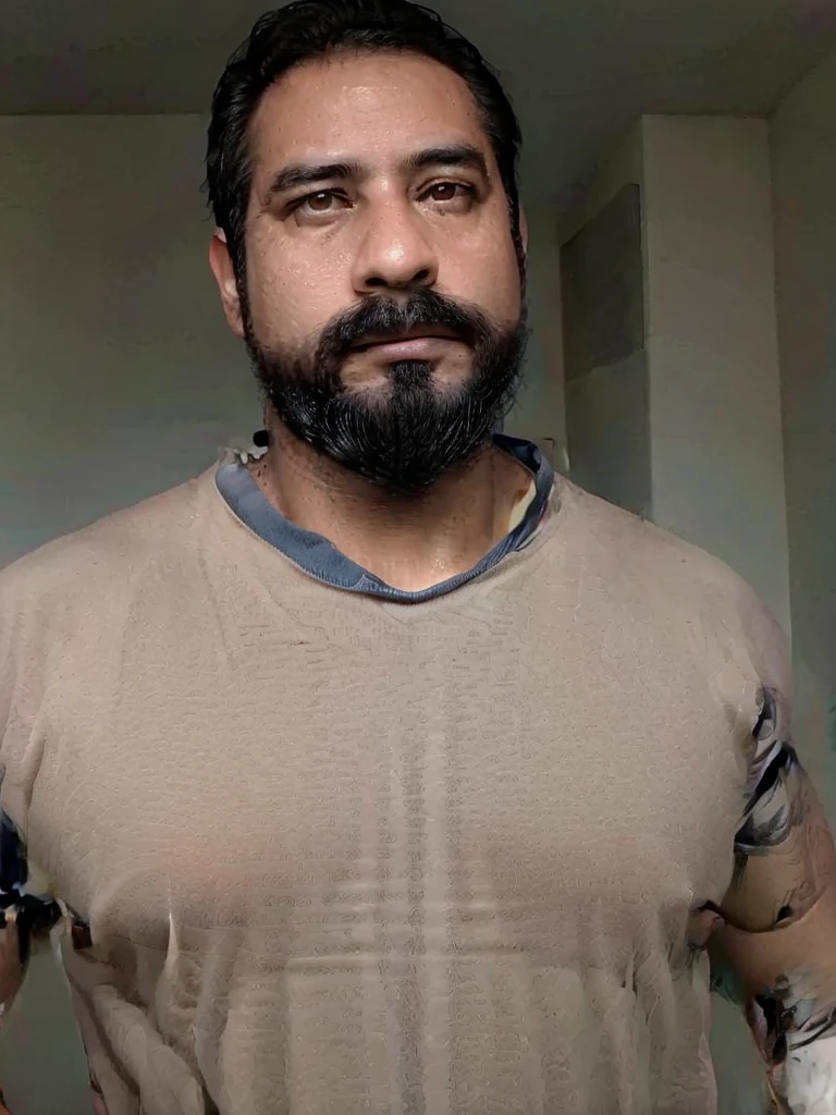 Masterpiece, Best Quality, ultra detailed, 1 man, macho male, muscular, piece, only, sportsman, beef, handsome, tanned skin, latino, 36 years old, negro hair, gray fur, goatee, too short hair, looking at the viewer, serious expression, Gray shirt, half body shot, science fiction subway background, Full body with jeans, backwards