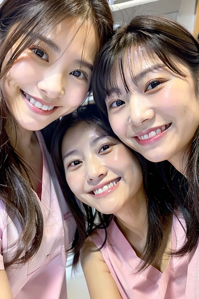 Dental hygienist, only two women, smiling, wearing light pink medical scrubs, short sleeves, Japanese, black hair, women in their early 20s Upper body close-up