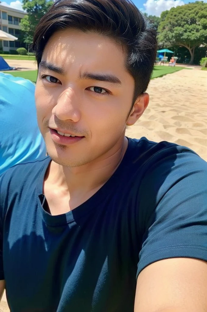 A handsome, muscular young Asian man looks at the camera. in a blue sports shirt , Fieldside, grass, beach, sunlight