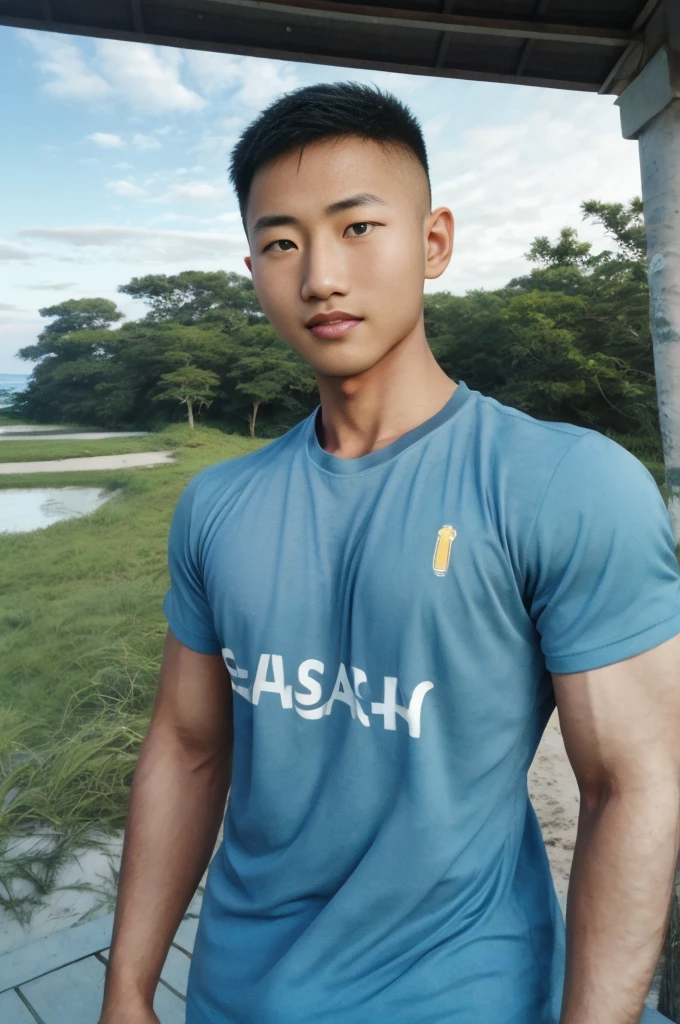 A handsome, muscular young Asian man looks at the camera. In a plain blue t-shirt , Fieldside, grass, beach, sunlight