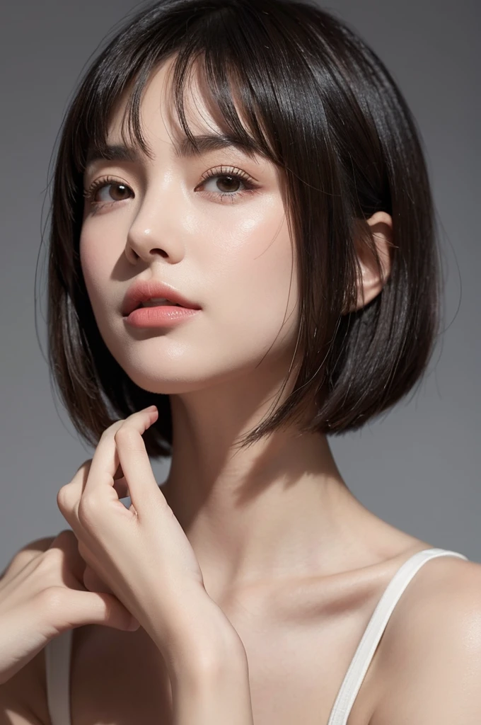 Create an up-close image of a young woman's face with a short bob haircut, characterized by a sleek and slightly tousled appearance. Her hair color is a soft brown with subtle highlights, and she has long, wispy bangs that frame her face delicately. She has a youthful, fresh look with minimal makeup, giving her a natural and radiant complexion. The background is plain and white, emphasizing her features. She wears a simple, white shirt that adds to the clean and effortless style of the image. One of her hands, with cute, neatly manicured nails, is firmly covering her mouth, adding a playful and thoughtful expression to her face. The overall mood is fresh, modern, and approachable.