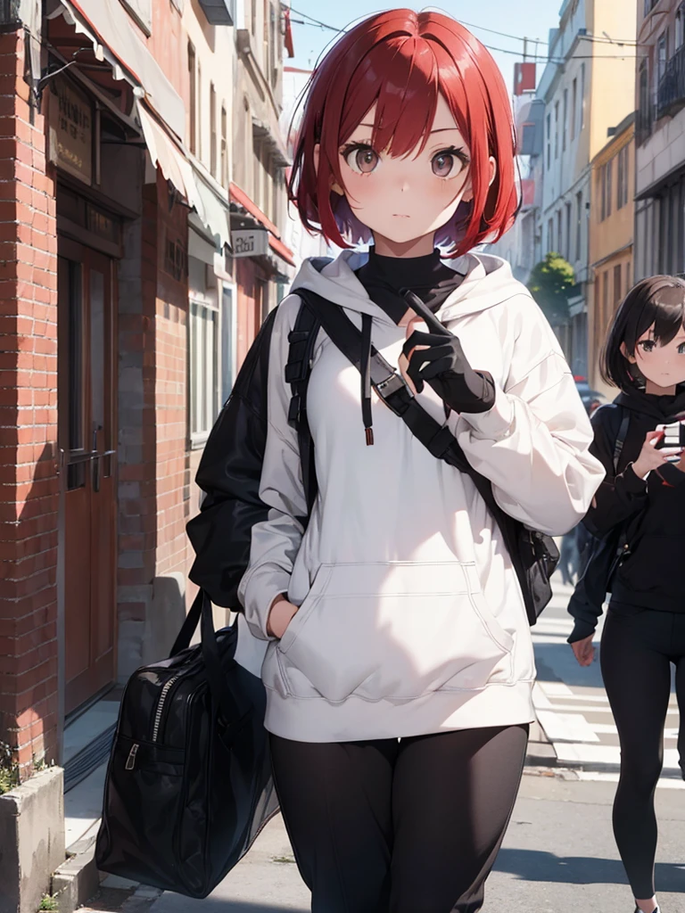A girl with short red Bob style hair, white skin, light brown eyes, black gloves, black hoodie on head, black pants with straps, looking at the mobile phone in her hands