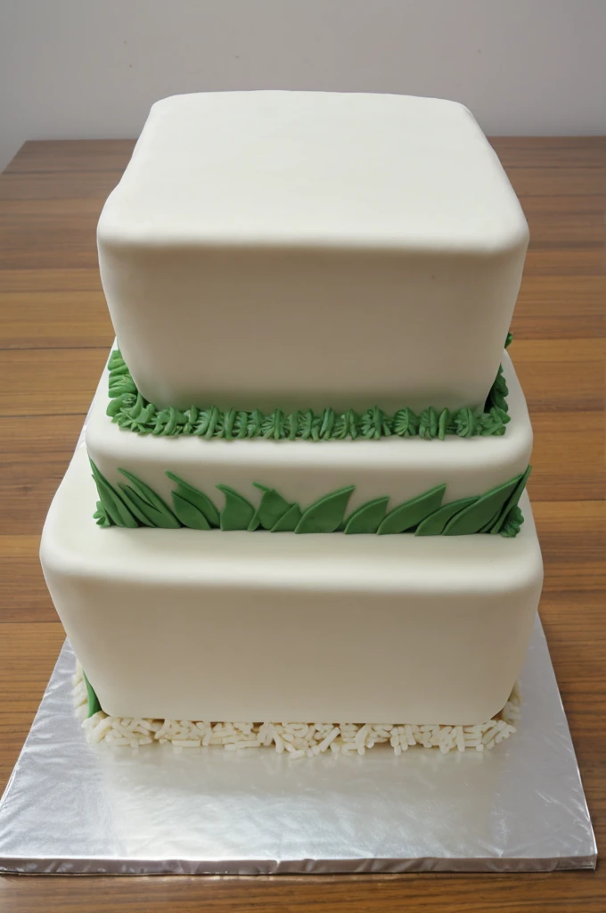 A square cake with rice paper a field