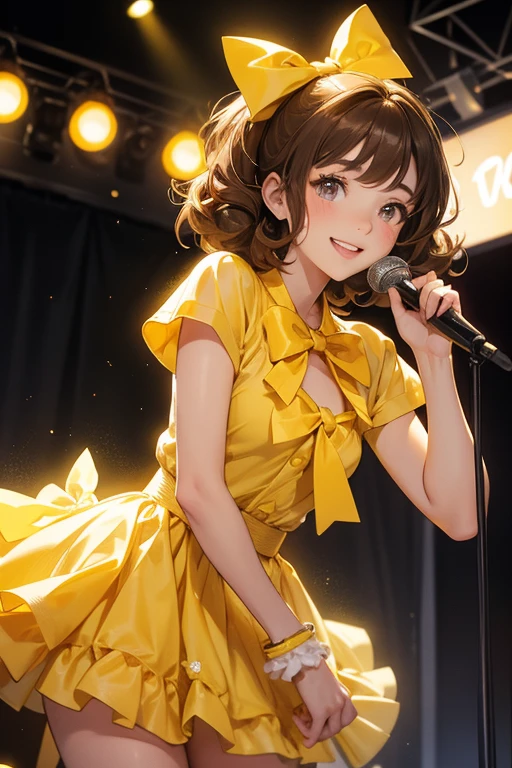 age Caucasian girl with short brown hair with two curls. Has brown eyes. Wears yellow pop star clothes and a large bow on her hair. Holds a microphone on one hand and is smiling.