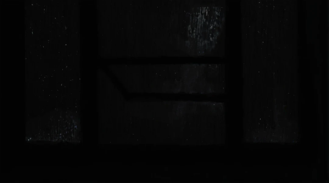 a close up of a window with a rain curtain on it, window ( rain ), dark eerie movie frame, background ( dark _ smokiness ), black ambient background, dark glowing rain, very dark background, in an empty black room, dark scene with dim light, 8 k. volumetric lighting. dark, grainy black and white footage, vhs static overlay