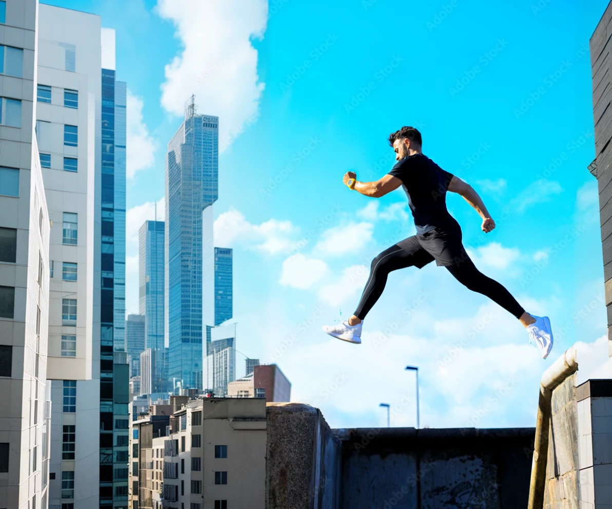 Man jumping over buildings