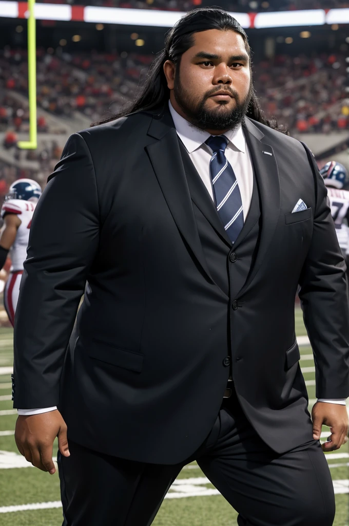 man from samoa, 30 years old, obese body, long black hair, football coach, beard, at a football field, wearing business suit